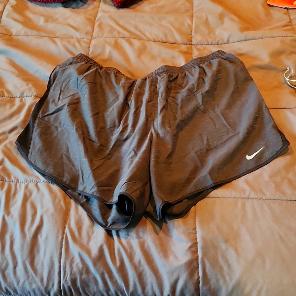 New with tags,  charcoal gray Nike running shorts,  size 1x